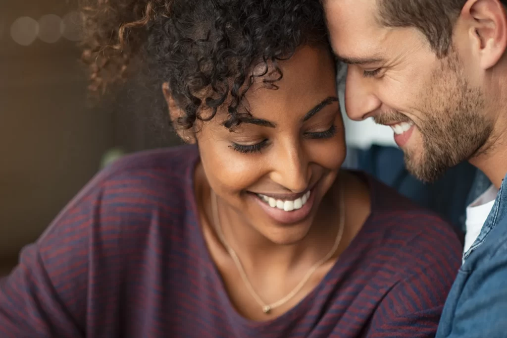 smiling couple enjoying romantic moment together i utc